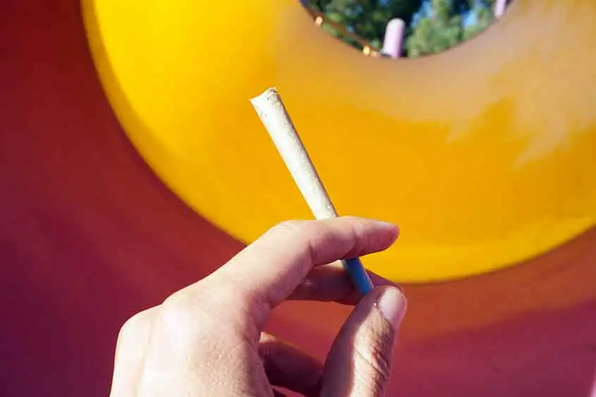 Closeup of hand holding a joint