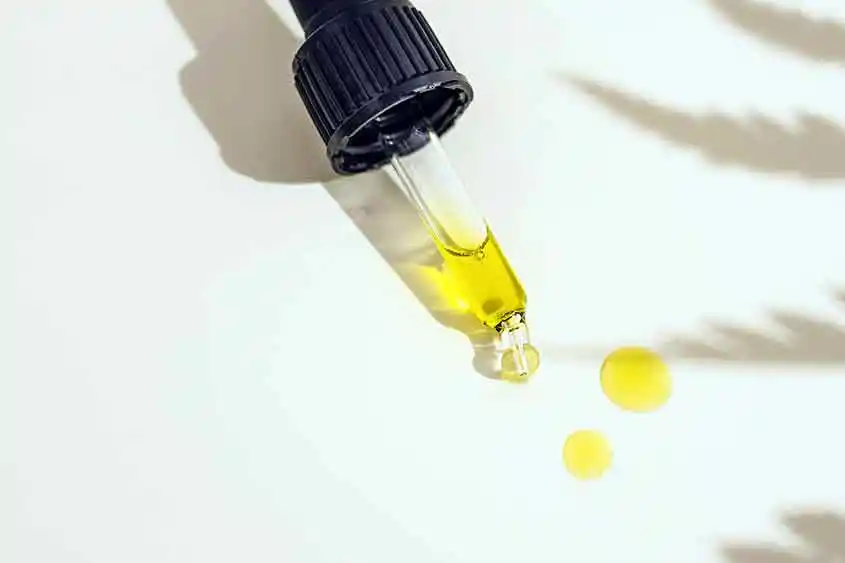 CBD oil in a dropper.