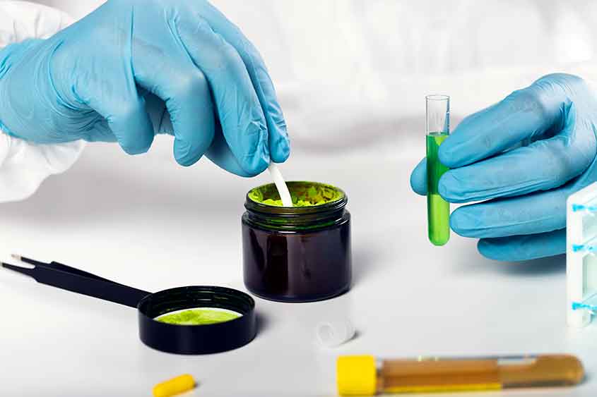 Cannabis extract being put into a test tube