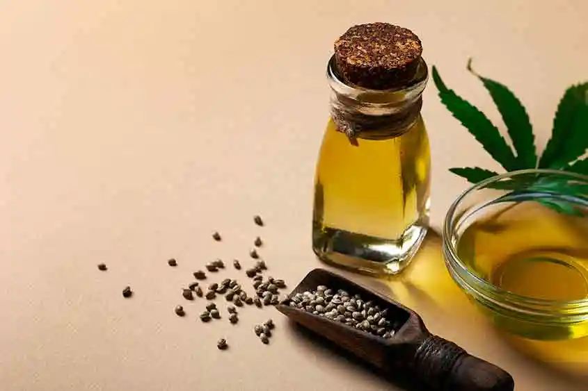 Cannabis oil, seeds and a leaf