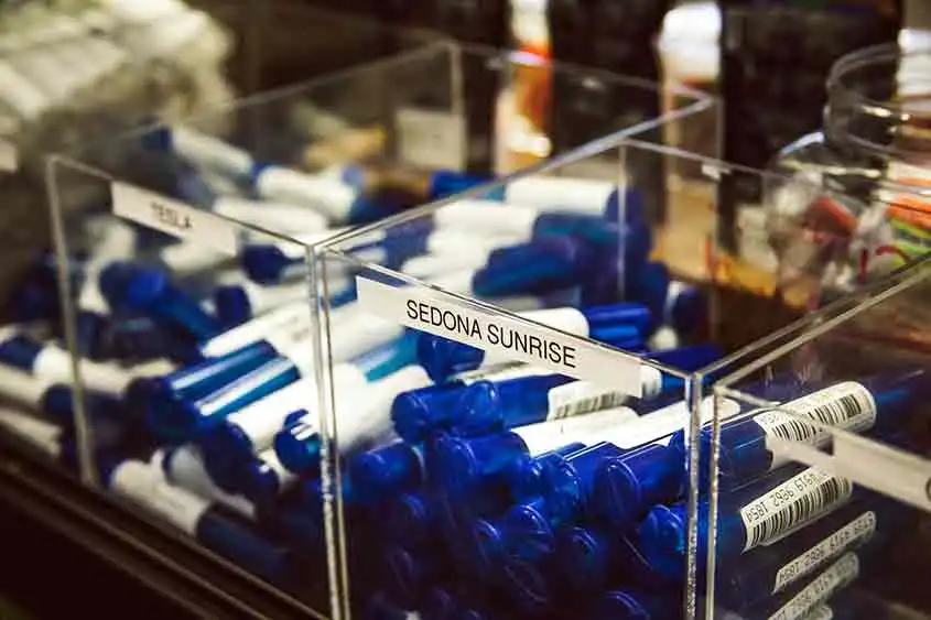 Medical marijuana pills in glass display containers.