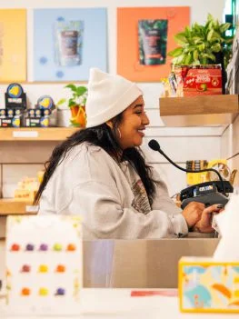 Woman buying something at a counter